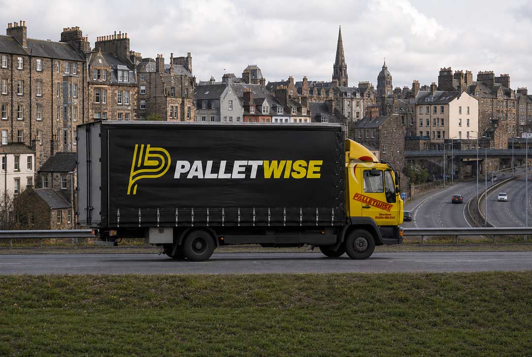 Palletwise lorry moving along a road