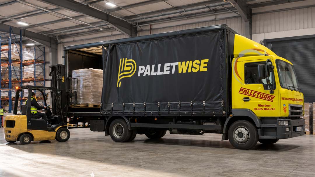 Palletwise truck being loaded inside a warehouse